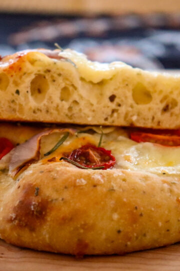 A small, decorative loaf of sourdough focaccia using this recipe.