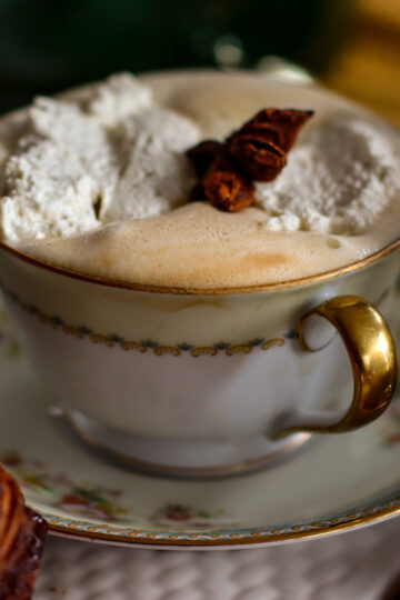 A cup of Eggnog Chai with Cardamon Whipped Cream.