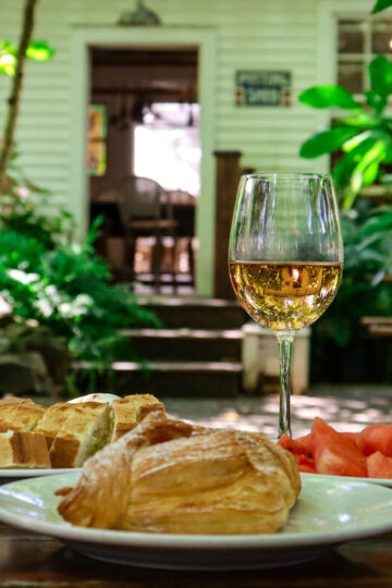 Several dishes from Kentucky Native Café in a beautiful garden setting.